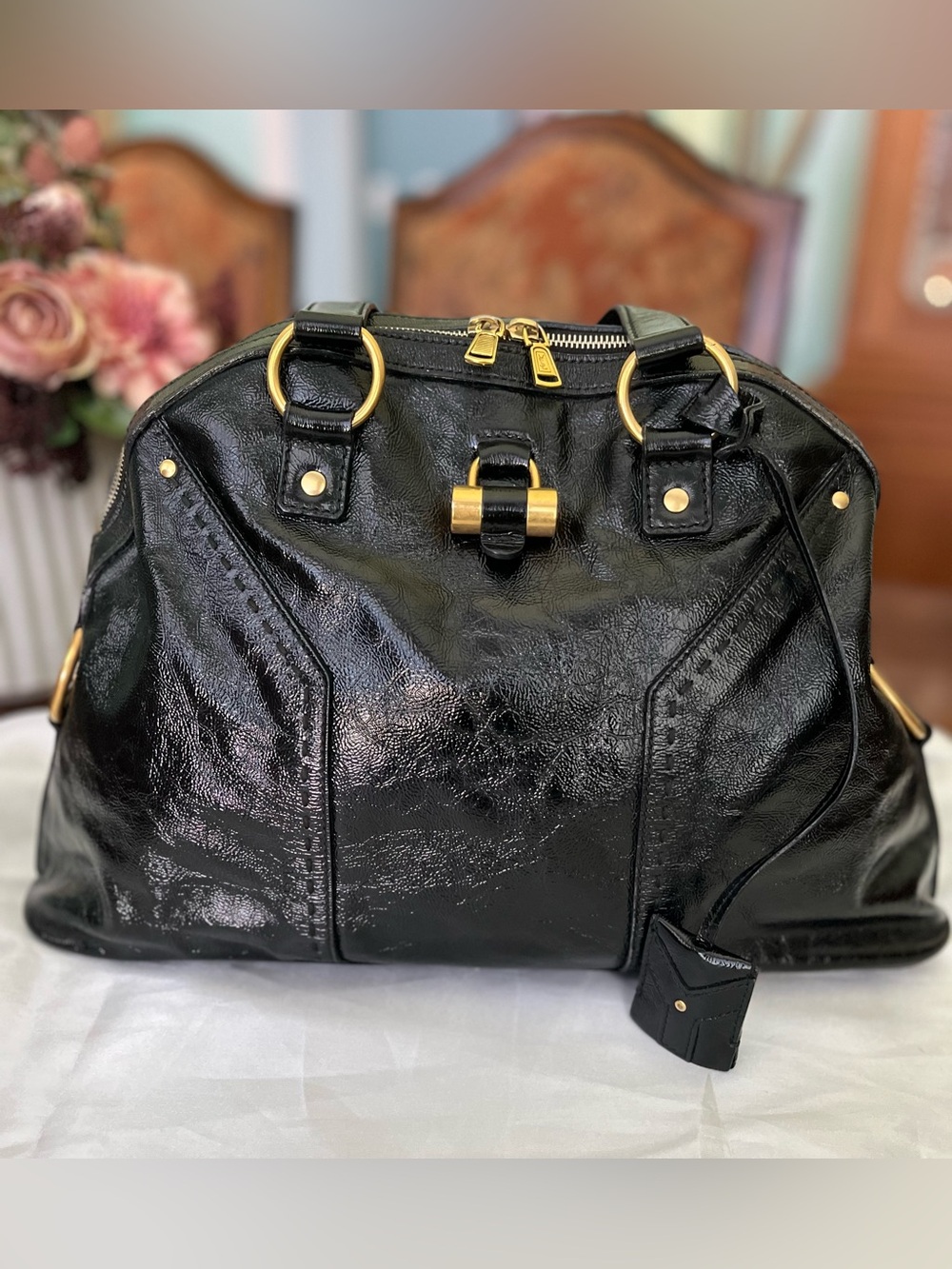 Yves Saint Laurent Muse Bag in textured patent leather with gold hardware & key